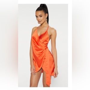Orange satin halterneck wrap bodycon dress